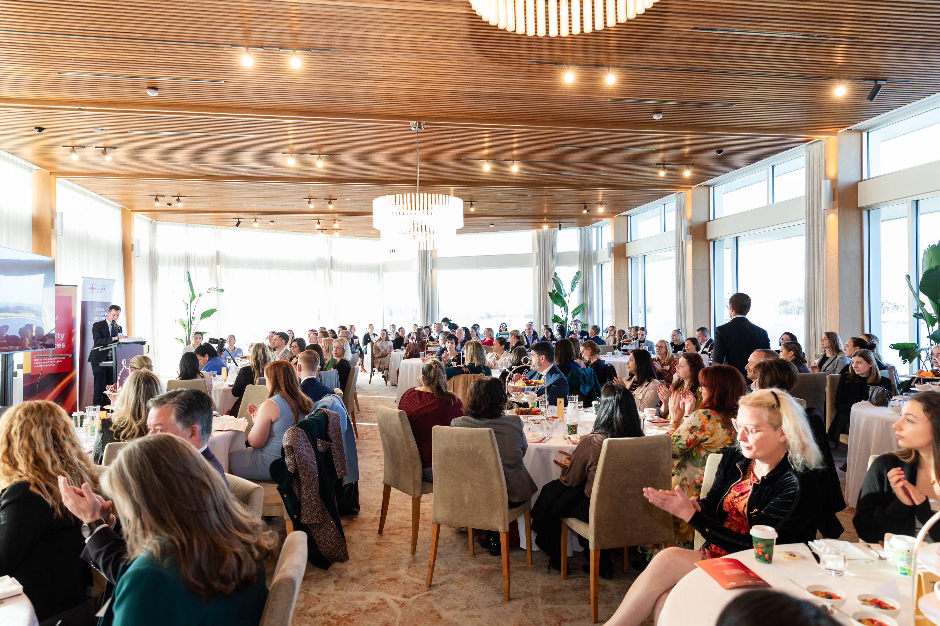 sitting people at a luncheon
