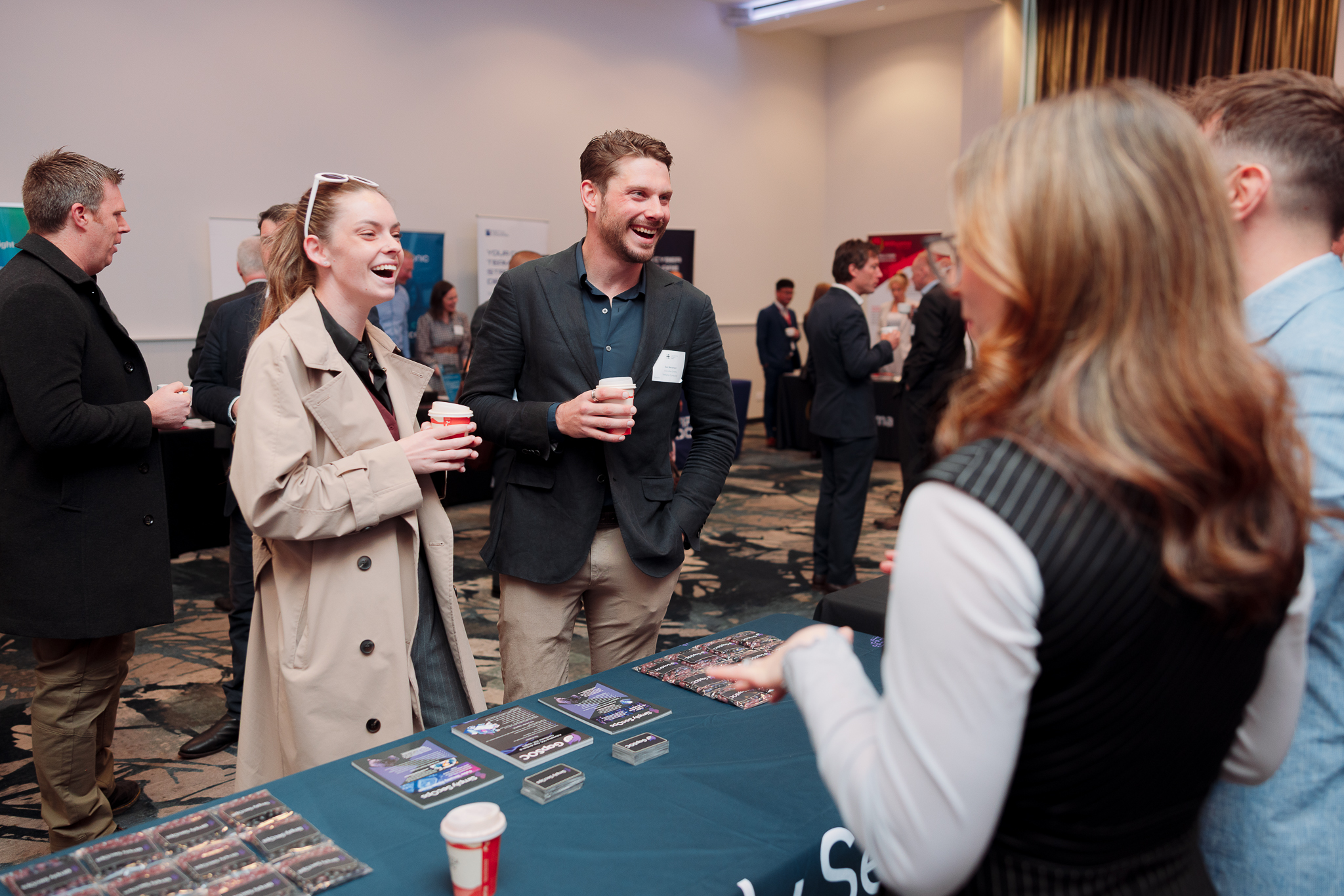 Photo of members networking before event